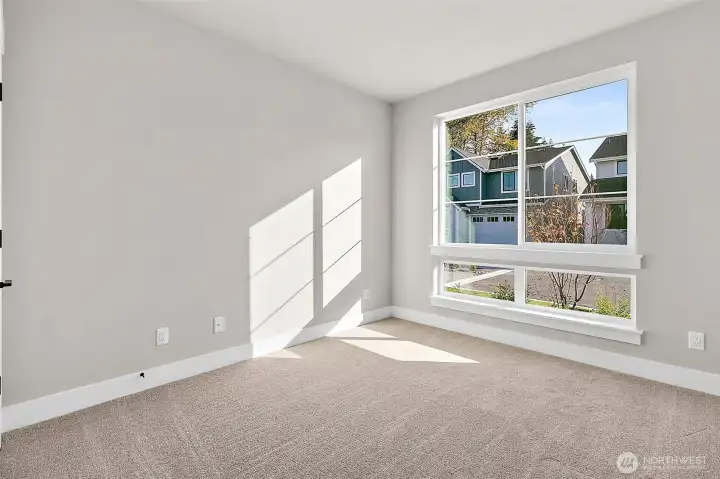 Main Floor Bedroom or Office - photos of another Plan 2665 built at a different Harbour Homes community. Details will vary.