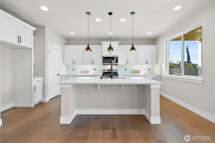 photos of another Plan 2665 built at a different Harbour Homes community. Details will vary.