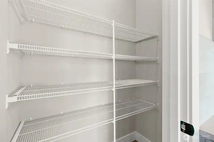 Kitchen Pantry - photos of another Plan 2665 built at a different Harbour Homes community. Details will vary.