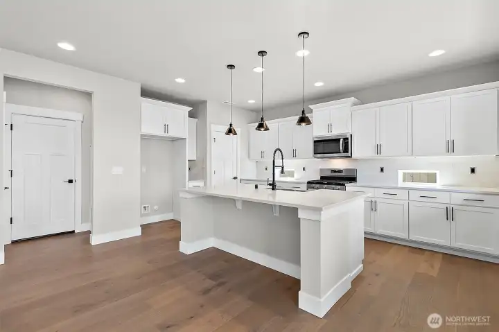 photos of another Plan 2665 built at a different Harbour Homes community. Details will vary.