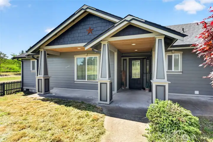 Covered front porch, add your patio chairs, if you choose!