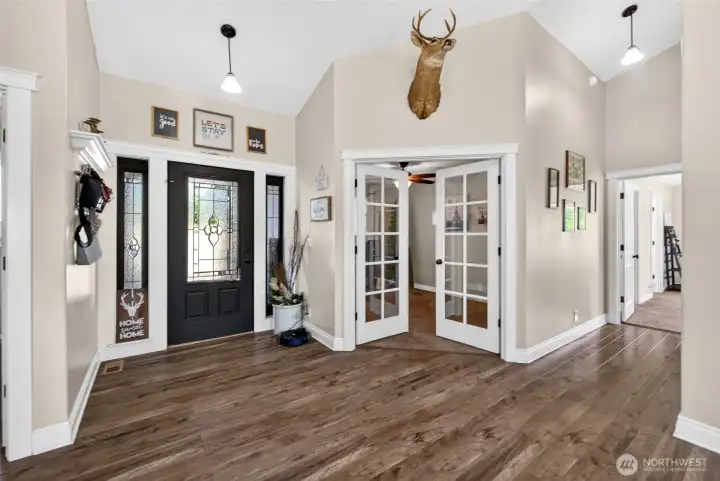 Front entry with office/4th Bedroom through the french doors.