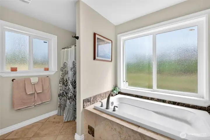 Soak your cares away in the tub or take a shower, if you prefer!