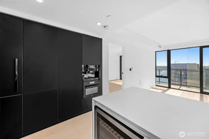 Stunning chef's kitchen with B&B Italia cabinetry, Miele appliances, and Kohler fixtures