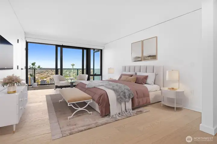 Primary bedroom with walk-in closet and access to wrap around deck and the views! (Virtually staged)