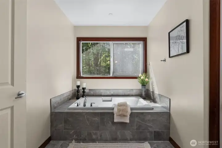 soaking tub in primary bathroom
