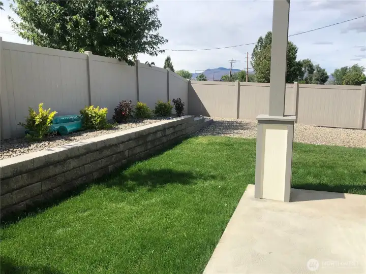 Private fenced backyard