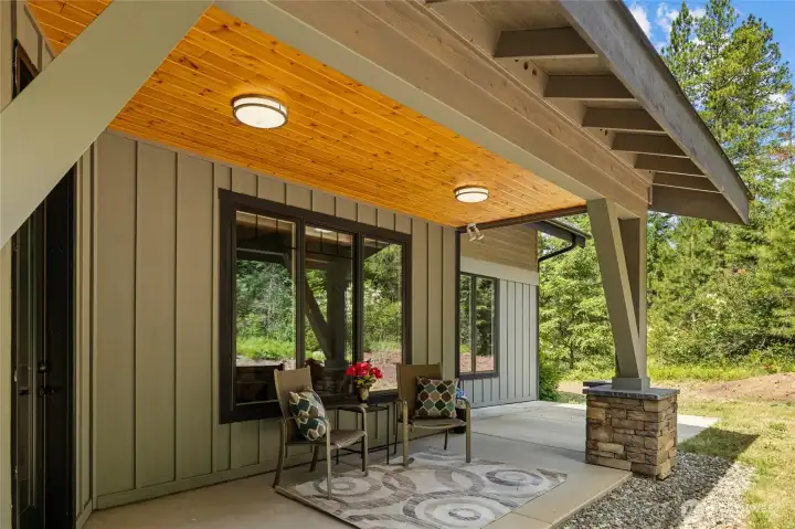 Beautiful outdoor covered patio that backs up to a green belt.