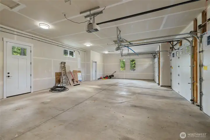 So much room for all your toys in this spacious 3 car garage.