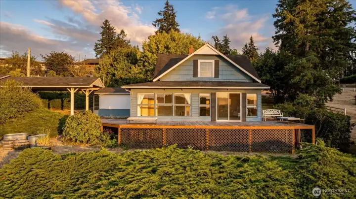 The home sits approximately on the upper 1/3 of the 10.63 acres. Dimensions are approximately 318.51' x 1475' x 311.42' x 1473'. To the right side of this photo is a large side yard pasture, as well as another up behind the house. Unseen in this photo is a small barn and a workshop building with storage. The home sits approximately on the upper 1/3 of the 10.63 acres. Dimensions are approximately 318.51' x 1475' x 311.42' x 1473'. To the right side of this photo is a large side yard pasture, as well as another up behind the house. Unseen in this photo is a small barn and a workshop building with storage.