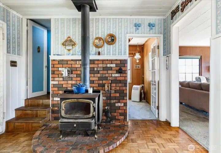 Cozy wood stove can heat the home. The old oil furnace no longer works. Cozy wood stove can heat the home. The old oil furnace no longer works.