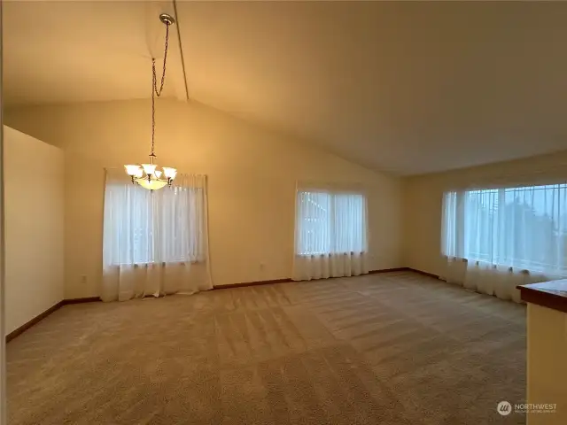 Formal livingroom and dining area. Awesome view of the Hood Canal and Olympic Mountains from front windows.