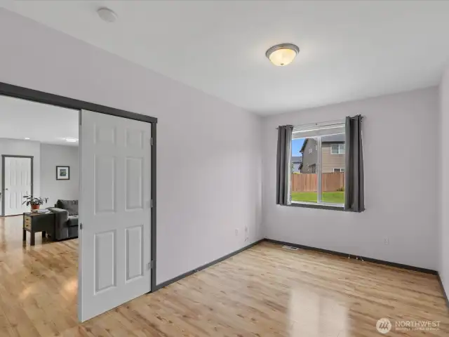 Other view of the main level bedroom w/out virtual staging.