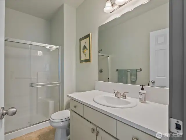 3/4 bath on main floor! Quartz counters and full size shower.