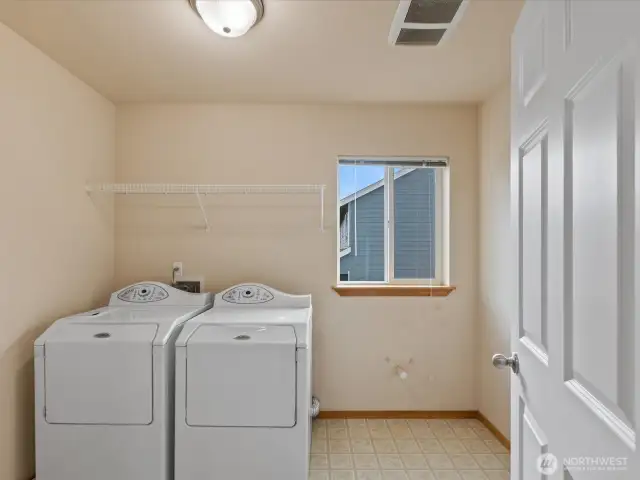 Laundry has room for a folding table or floor cabinet. Dryer vent recently cleaned.