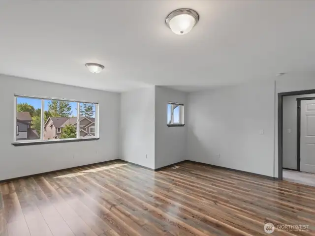 Other view of bedroom 1 w/out virtual staging. South facing windows.