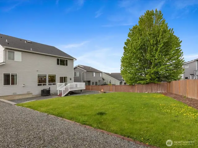 Owners had extensive landscaping done including grass, watering features, garden beds, and retaining walls.