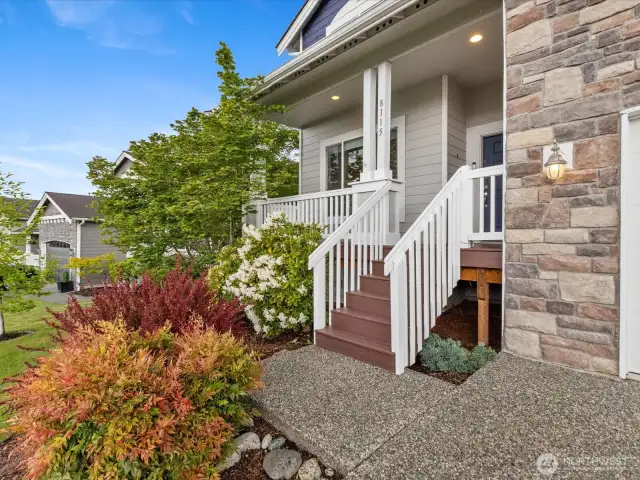 Inviting front porch with fresh paint.