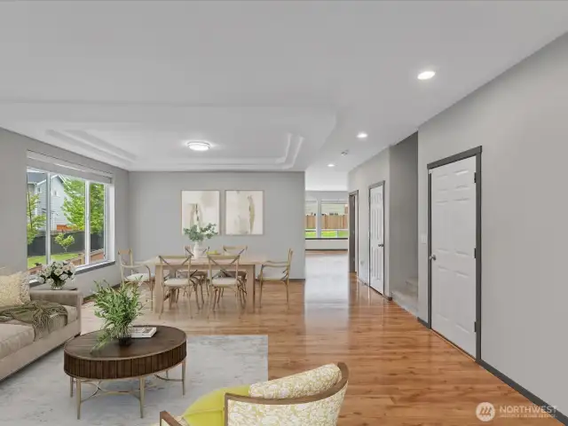 Grand living and dining rooms with gorgeous laminate flooring.