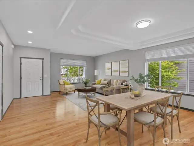 Custom look with this tray ceiling and expansive windows. Wide slat faux wood blinds through much of the home.