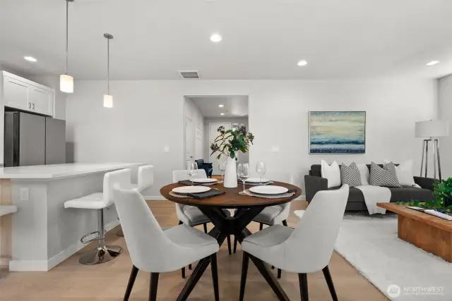 Whether you're hosting a formal dinner or a casual gathering, the home's thoughtful layout offers flexible dining options—with additional seating just steps away at the island.