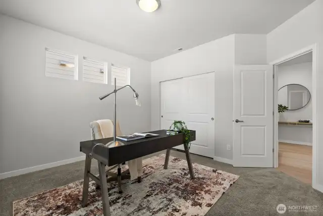 Located off the entry, this 4th bedroom offers the flexibility of main level living or a remote office if desired.