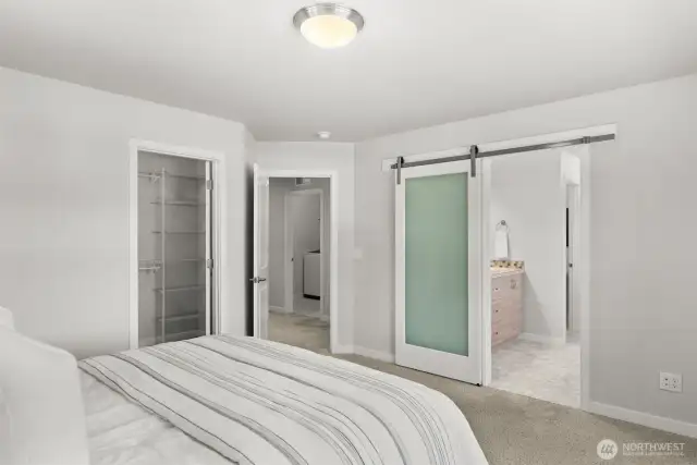 A glass barn door, a Rush trademark, adds privacy with style!