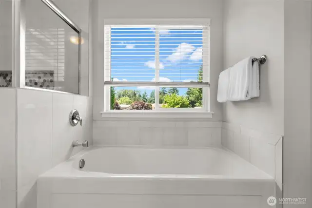 Unwind in this deep-set tub at the end of a long day to rejuvenate your body and mind.