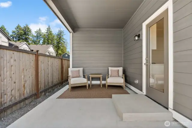 Step out to the patio from the kitchen, perfect for indoor-outdoor entertaining.