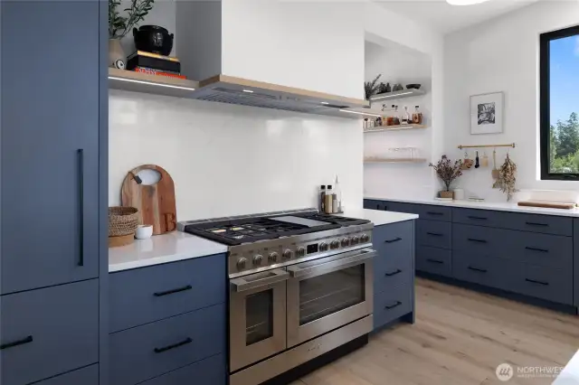 Paneled Liebherr fridge and dual Smeg range.