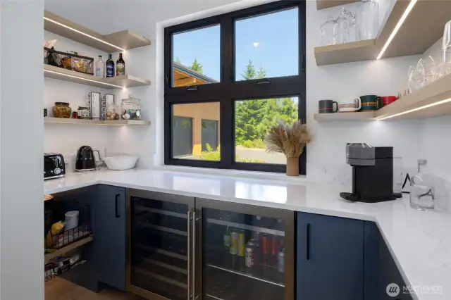 Awesome pantry off the kitchen w/wine & beverage fridge.