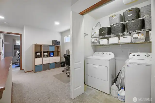 Flexspace and laundry room with amble storage