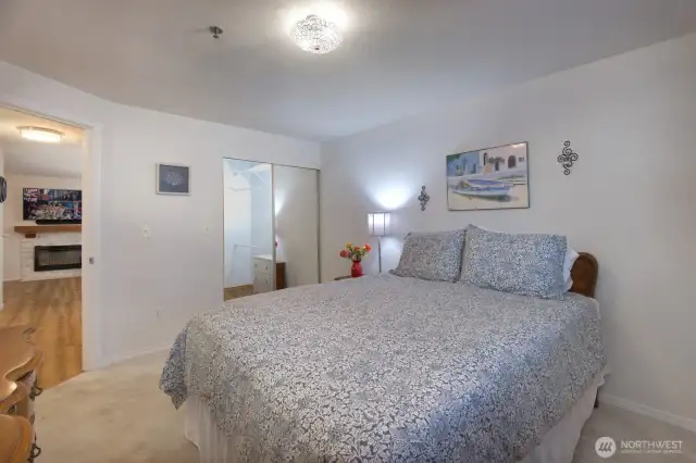 Another shoot of the bedroom looking back at the huge walk in closet with sliding mirror doors.