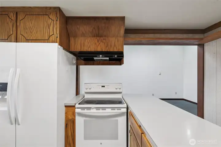 View in kitchen into large dining room
