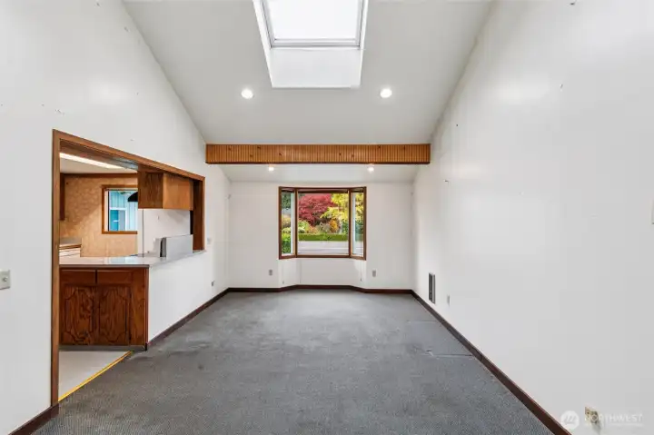 Dining room w/ skylights and vaulted ceilings