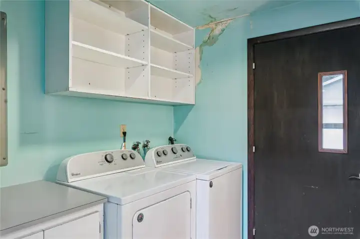 Laundry room off dining room - back door entrance