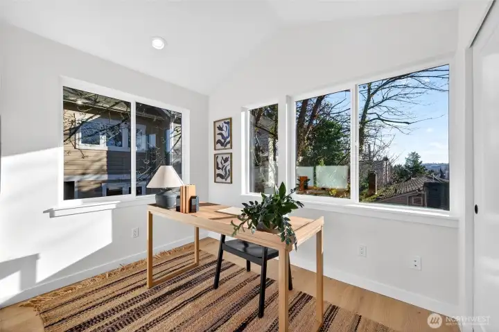 Bedroom one SE corner with vaulted ceilings