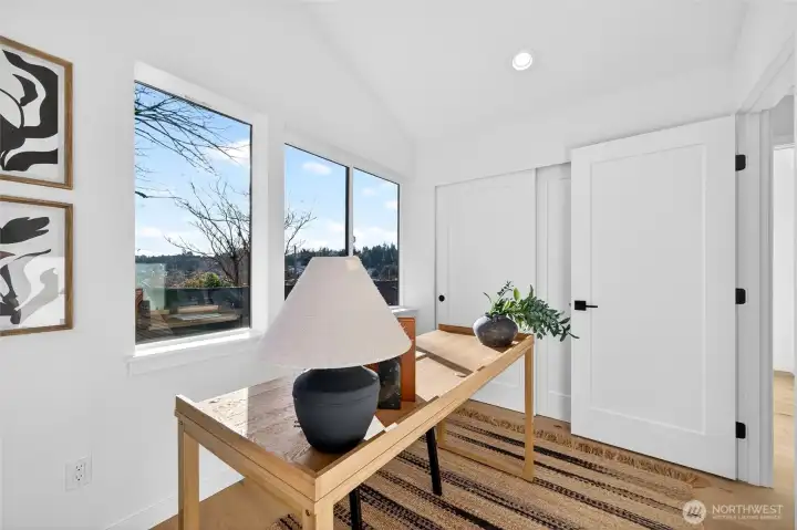 Bedroom one SE corner with vaulted ceilings