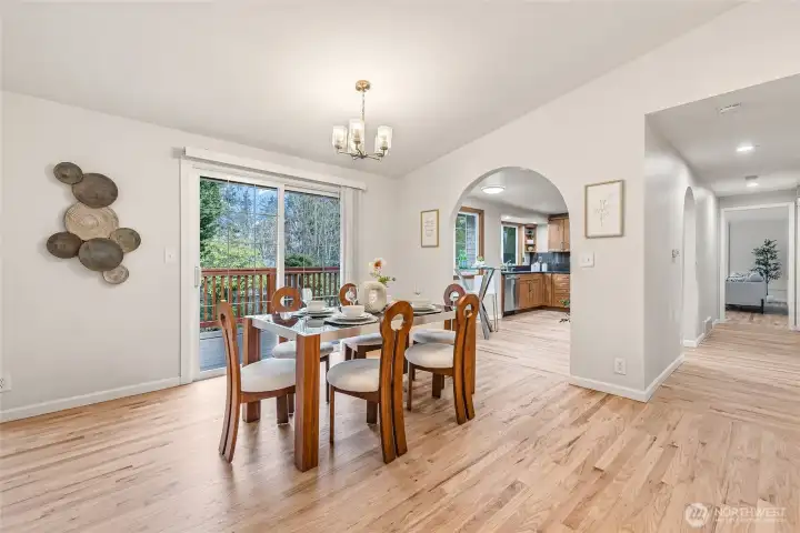 Elegant dining room with sliding door to the backyard.