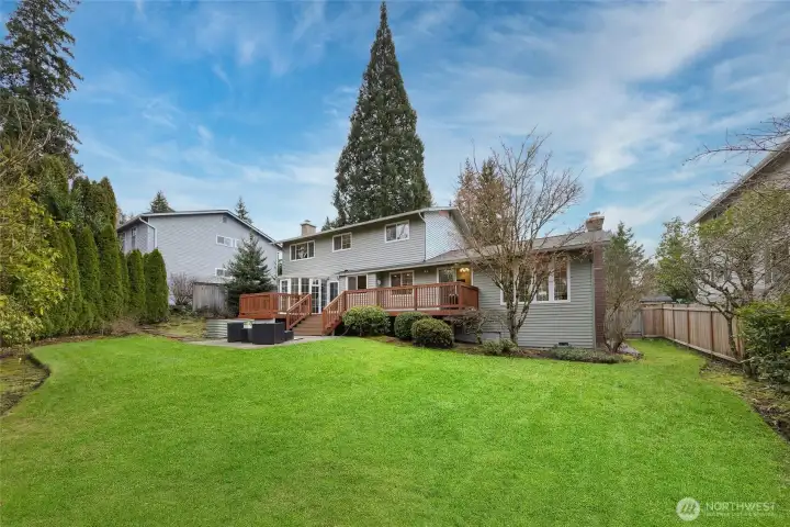 Flat, fully fenced private backyard.