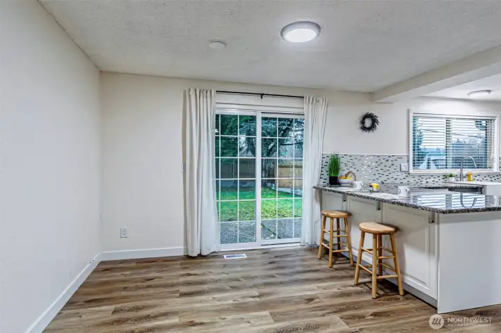 Awesome eat in space right off the kitchen both at the counter and space for another table.