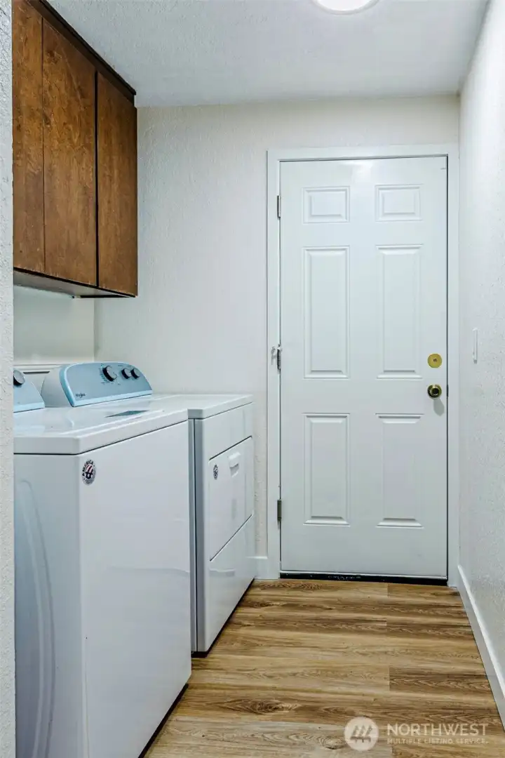 Laundry room leads to the garage.