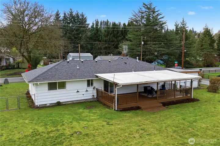 The brand new roof and wonderful, covered back deck are just a couple of its many features.