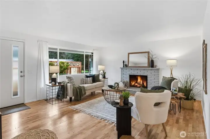 Gorgeous, original, and newly refinished hardwood floors grace the home.