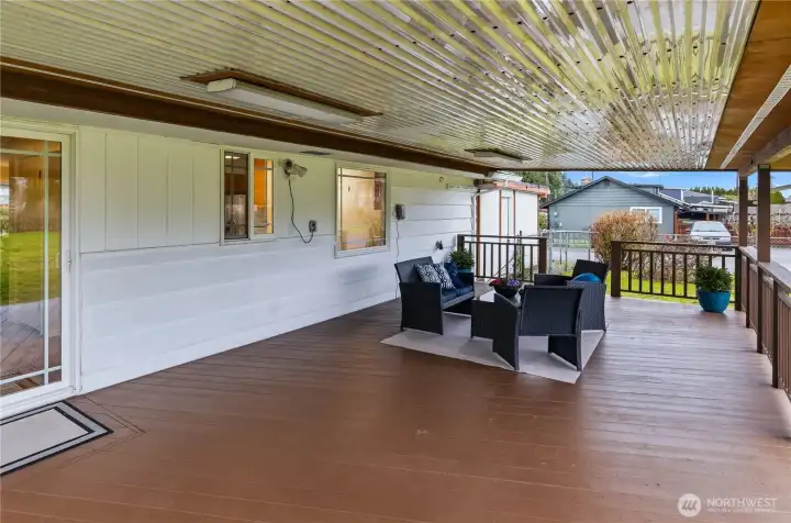 This wonderful deck is an extension of the home's living space, offering year round enjoyment.