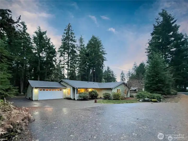 RV Parking and electric hookup next to the garage. This huge driveway has room for a party.