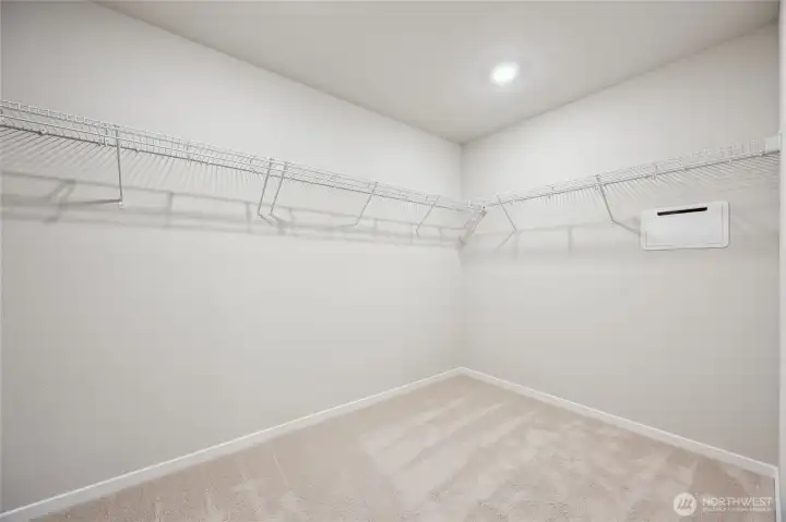 Spacious primary closet. Picture for representational purposes only, colors and features may vary.
