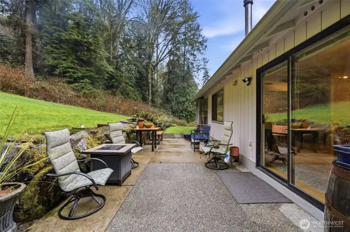 Patio just off the dining area, accessed through sliding doors for easy indoor-outdoor connection.