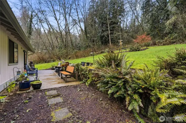 Private setting with surrounding space, offering a peaceful and secluded outdoor environment.