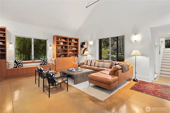 To the right of the entry, the living room